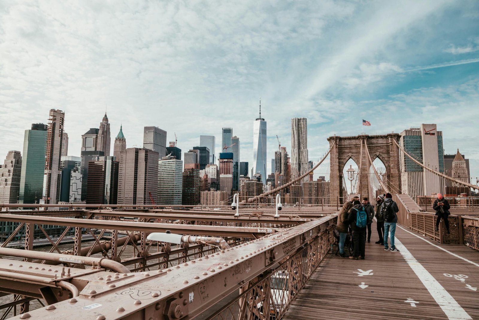 Explore the iconic Brooklyn Bridge with a breathtaking view of New York City's skyline. Perfect for urban travel enthusiasts.